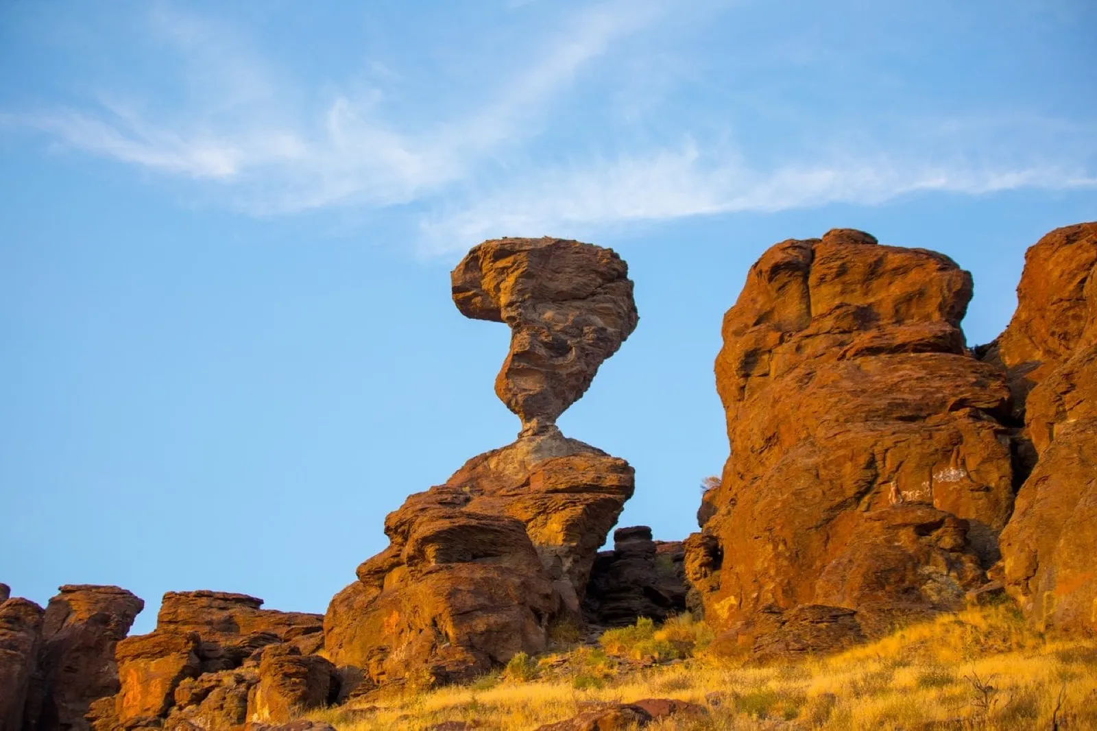 Balanced Rock, an iconic high-desert formation in the Magic Valley near Twin Falls, Idaho, glowing at golden hour